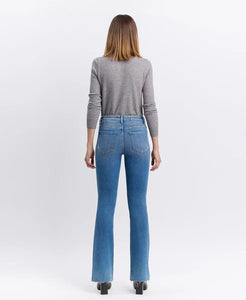 Mid Rise  Boot Cut Jean w/Raw Hem