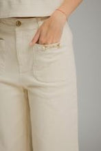 Load image into Gallery viewer, Solid wide leg pants featuring a zip-fly button front closure.
